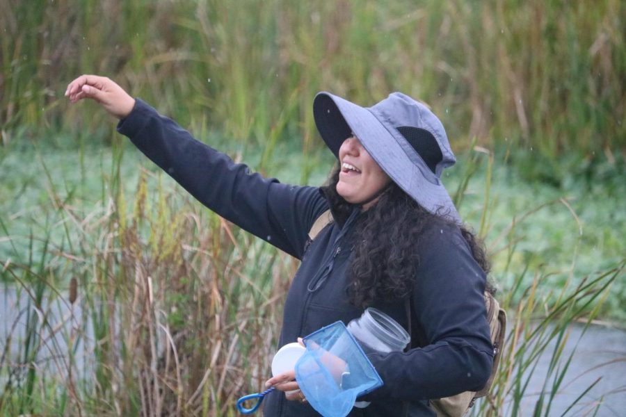 John Bunker Sands Wetland Center educator Nancy Pineda Gama teaches her group how to collect water samples at the John Bunker Sands Wetland Center in Combine on Nov. 11. CHS Eco Club went on a field trip to the John Bunker Sands Wetland Center to learn about wetland ecology.