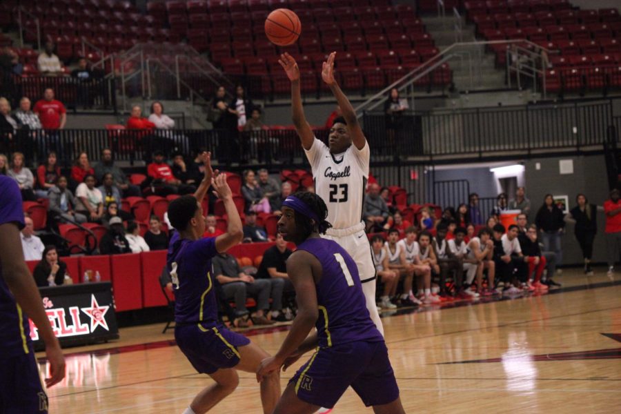 Coppell freshman forward Sibu Socks makes a jump shot against Richardson at CHS Arena on Nov. 29. Coppell defeated Richardson, 68-64. Photo by Olivia Short.