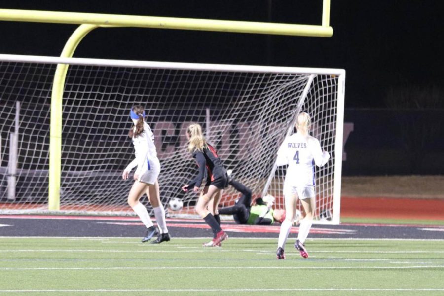 Coppell sophomore midfielder Summer Chen scores against Plano West, marking the first goal of the game. The Cowgirls won 4-1 on Wednesday night at Buddy Echols Field.