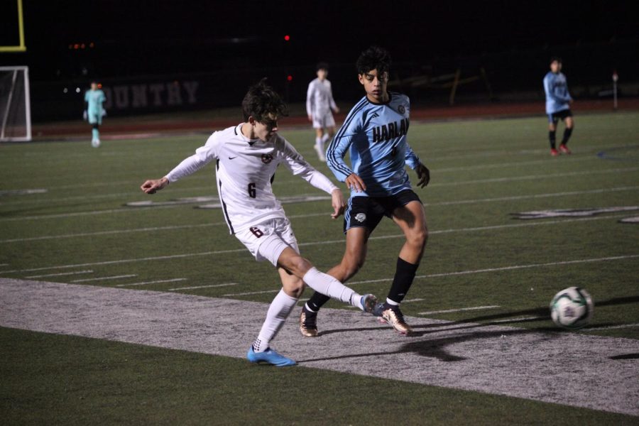 Coppell junior midfielder Sam Stone passes against San Antonio Harlan at Buddy Echols Field on Thursday. On Thursday, the Cowboys defeated Harlan, 3-1 in the penalty shootout. On Friday, it won over Southlake Carroll 4-0, and defeated Irving, 1-0, on Saturday to claim the title. 
