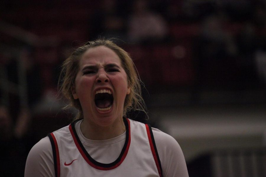 Coppell senior guard Jules LaMendola screams after making a shot against Hebron in CHS Arena on Jan. 6. The  Hawks defeated the Cowgirls, 58-50.