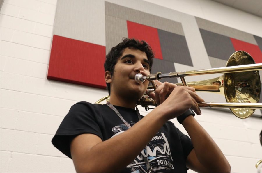 Coppell High School senior Arman Pathan practices trombone in the band hall on Jan. 27. Pathan is a member of the CHS Band and will be training with the Blue Stars Drum and Bugle Corps this summer.