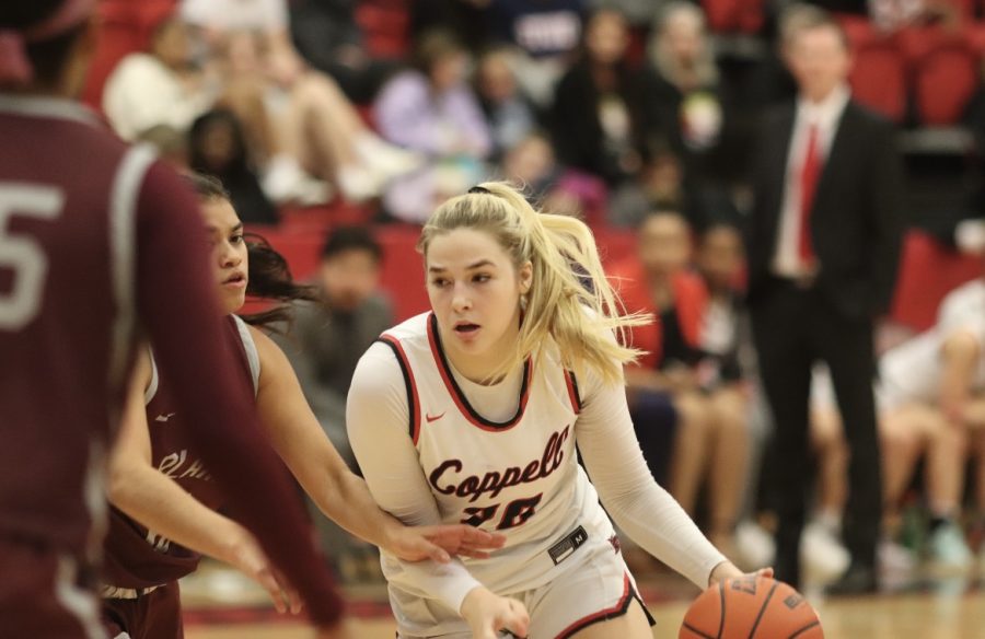 Coppell senior guard Jules LaMendola drives to the basket against Plano. The Cowgirls defeated the Wildcats, 85-66, at CHS Arena on Tuesday night.