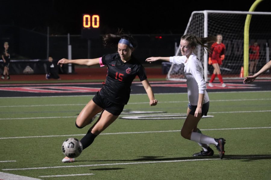Coppell senior defense Kayleigh St. Peter dribbles against Plano on Feb. 13 at Buddy Echols Field. With a 3-0 victory, the Coppell girls soccer team ended its losing streak. 