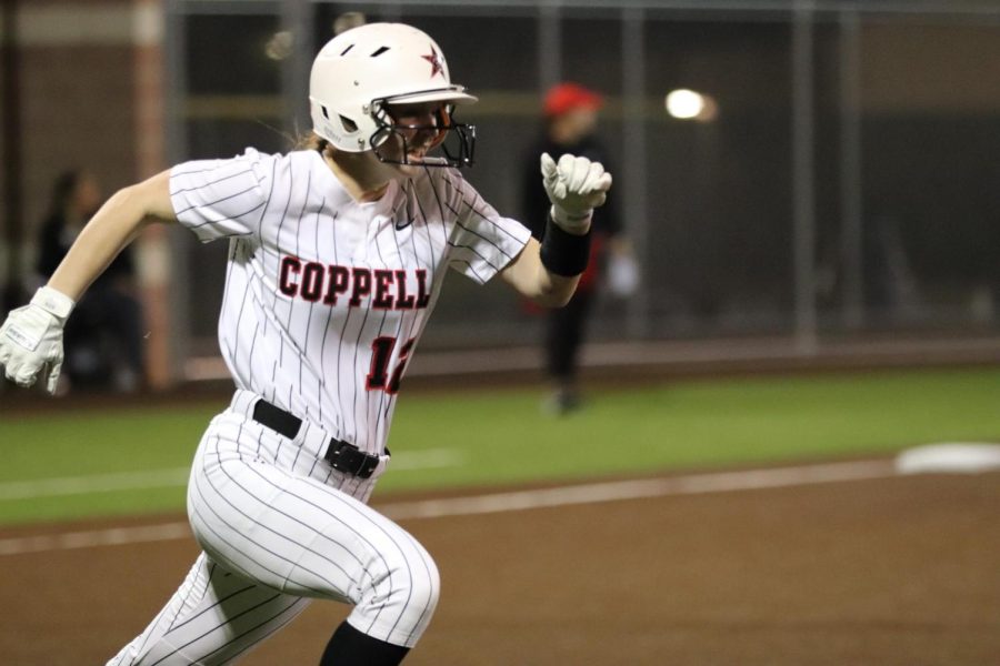 Coppell senior Sabina Frosk runs to first base against Denton Guyer at the Coppell ISD Baseball/Softball Complex on Tuesday. The Cowgirls lost to the Wildcats, 15-5.