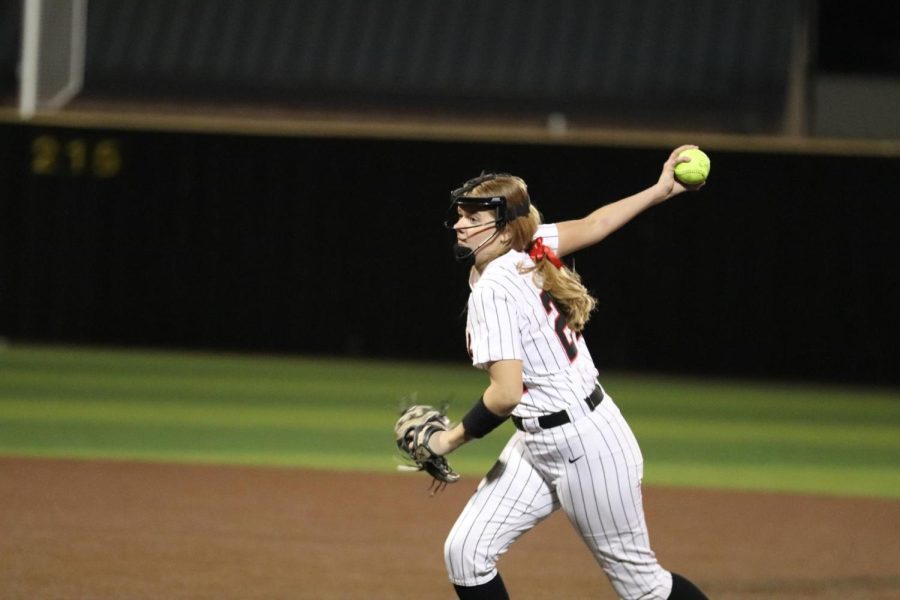 Coppell freshman Kaelyn Smith pitches against Denton Guyer at the Coppell ISD Baseball/Softball Complex on Tuesday. The Cowgirls lost to the Wildcats, 15-5.