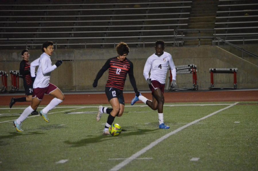 Coppell junior forward Luca Grosoli carries past the defense on Friday at Buddy Echols Field. Coppell plays Plano West tonight at 7 p.m. at Buddy Echols Field.