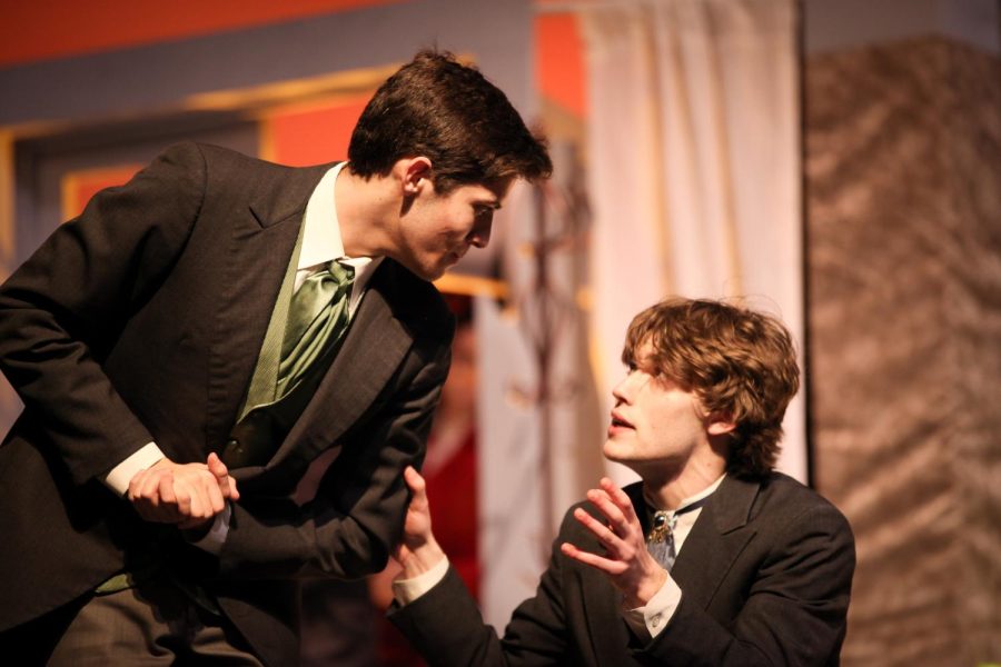 Coppell senior Tyler Schweitzer (Jack Worthing) and Jude Taylor (Algernon Moncreiff) rehearse in CHS Auditorium on Feb. 23. The Cowboy Theatre Company is taking Oscar Wilde’s The Importance of Being Earnest to the 2023 UIL One Act Play competition at 2 p.m. on Thursday for district competition  at Lewisville High School.