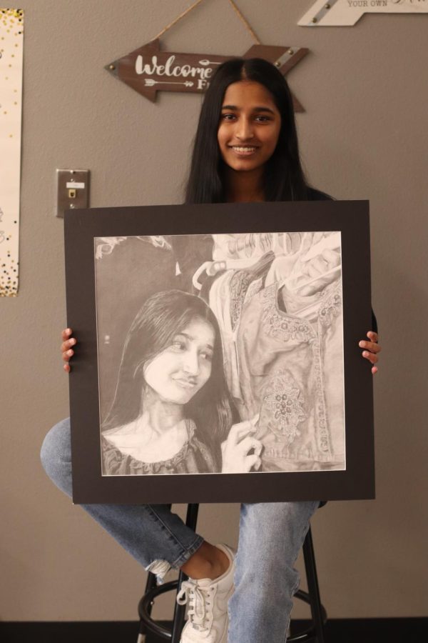 Coppell High School sophomore Melora Dominic created artwork titled “Fading.” Dominic qualified for State VASE for her art piece “Floral Photoshoot” last year and continues to use art as her creative outlet. 