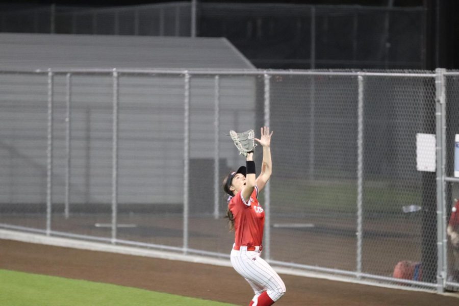 Coppell senior first baseman Emily Fishcetti catches a pop up  by Hebron at the Coppell ISD Baseball/Softball Complex on Wednesday. The Cowgirls lost to the Hawks, 4-2.
