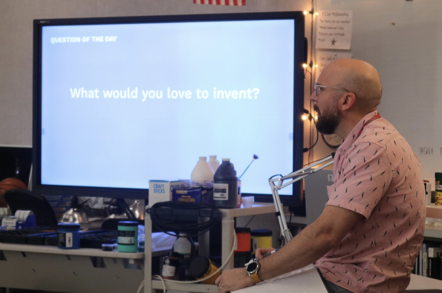Coppell High School art teacher Brennan Frugé discusses the question of the day with his AP art class on Wednesday. Frugé began teaching at CHS in August of 2022 and previously worked as an art teacher at Sloan Creek Intermediate School in Lovejoy ISD, teaching fifth and sixth grade.