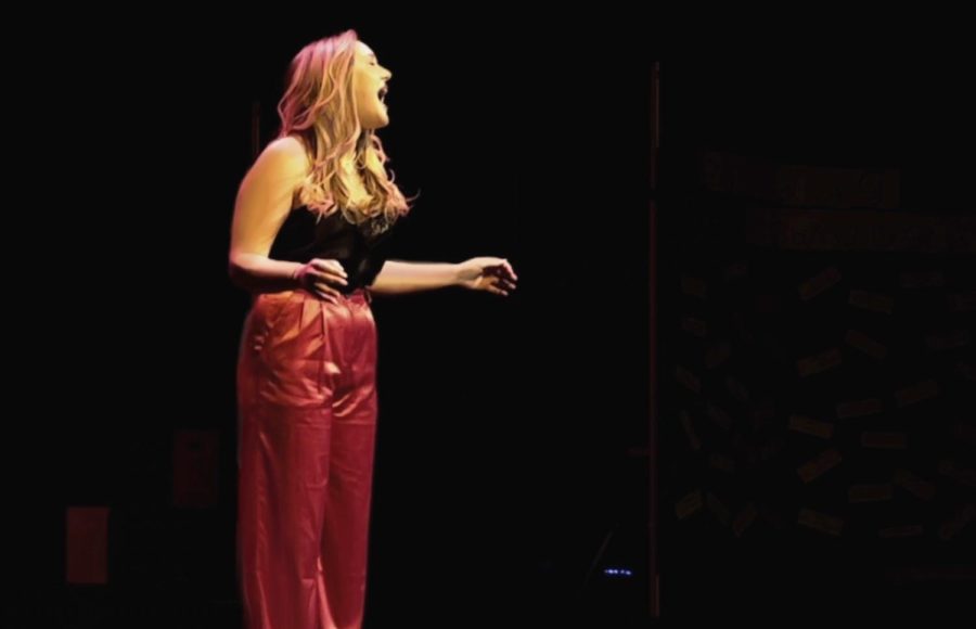 Coppell High School senior Trinity Tackett sings “Maybe This Time” from “Cabaret” during the Senior Showcase on Sunday in the CHS Black Box Theatre. Throughout her senior year, Tackett has been inclusive and welcoming to underclassmen new to high school theater.