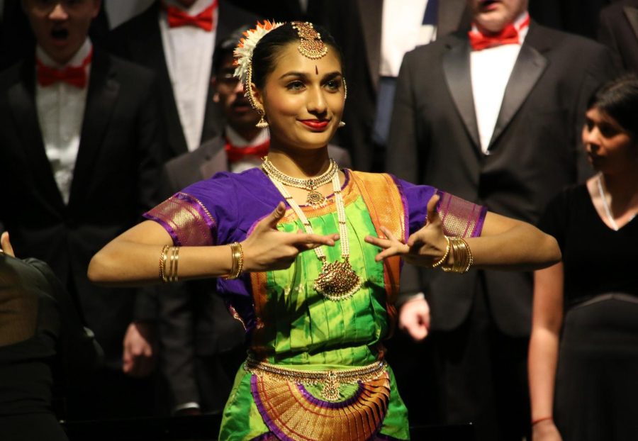 Coppell High School sophomore Aishwarya Anandkumar performs a classical Indian Bharatanatyam dance while the A Capella Choir sings “TāReKiTa” by Reema Esmail on April 11 in the CHS Auditorium. The Spring Choir concert featured pieces choirs performed during their UIL competitions. 