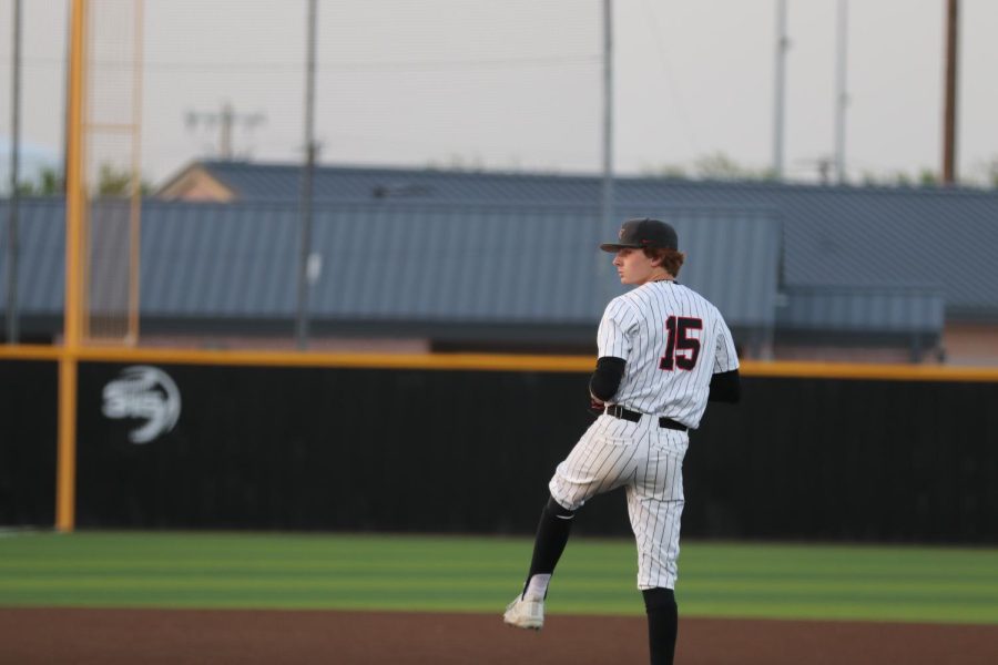 Coppell senior Bryan Raitz pitches in the first inning against Plano at the Coppell ISD Baseball/Softball Complex on Friday. Coppell defeated the Wildcats, 3-0.