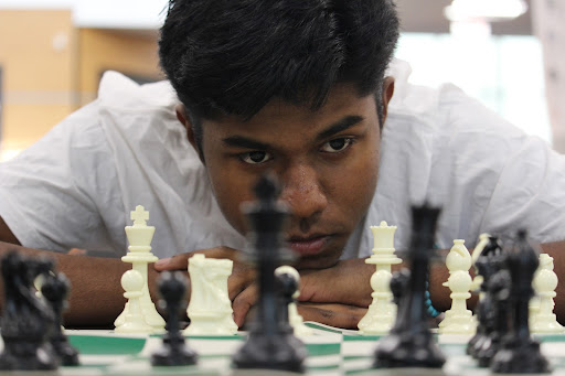 Coppell High School junior Sharvesh Deviprasath practices his strategies while playing chess. Deviprasathwas awarded first place at the Texas State Chess Championships on March 5 and was named co-champion of the 2023 National High School Championship