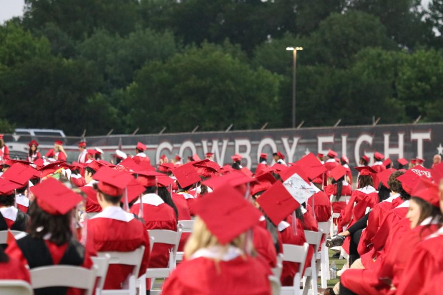 Coppell High School seniors spend their final moments at CHS during the 2023 graduation ceremony. The CHS graduation ceremony was held at Buddy Echols Field on Friday night. 