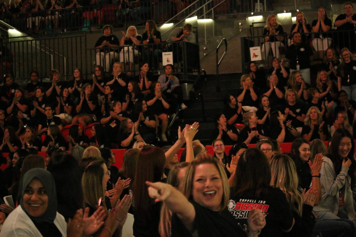 CISD staff show their spirit at district convocation by cheering as their school is announced on the screen. The annual CISD Convocation was held at CHS Arena on Thursday for district staff to get excited for the school year and kick off the theme of #CISDMissionPossible.