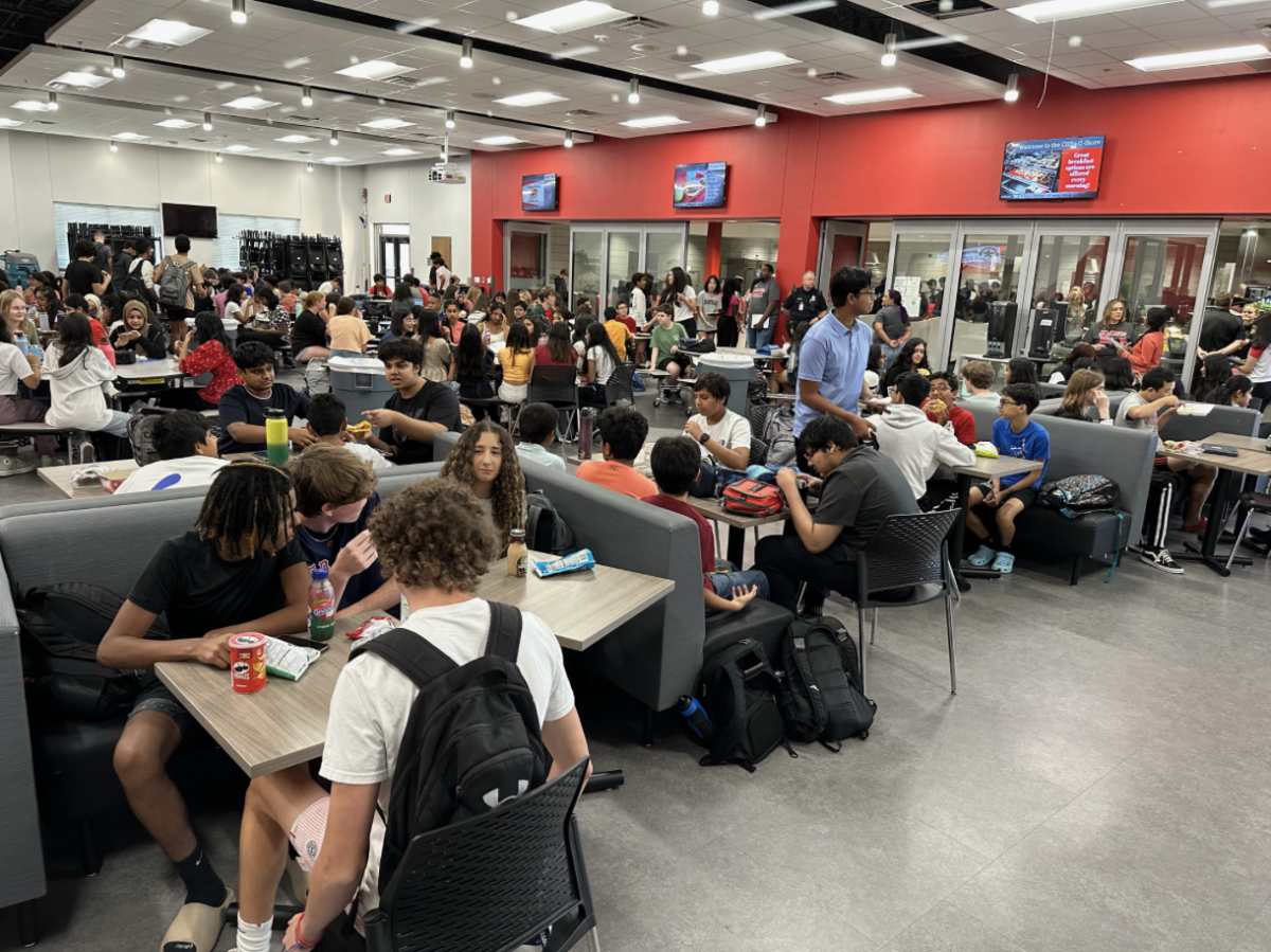 Coppell High School Ninth Grade Campus students eat lunch together in the cafeteria. The districts first day of school for the 2023-24 school year was Tuesday. 