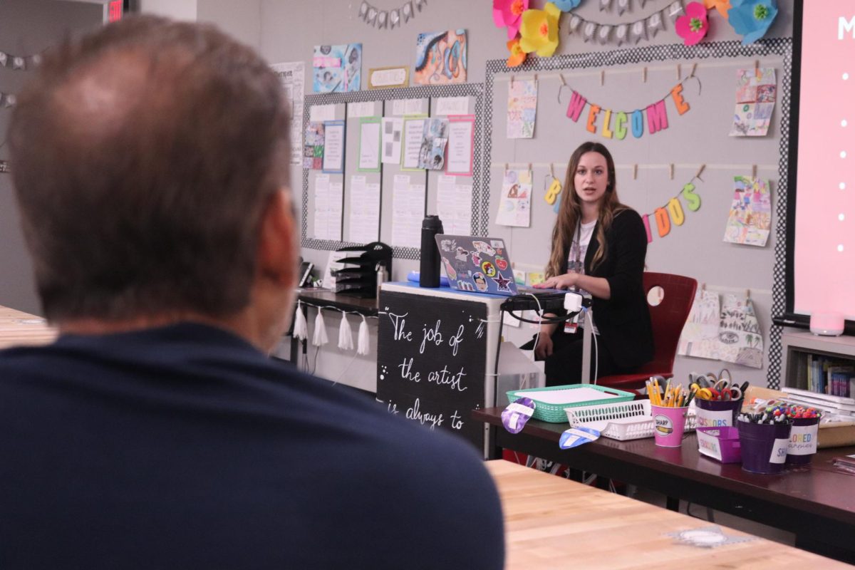 Coppell High School art teacher Sarah Williams shares a little about herself during Curriculum Night. Curriculum Night took place Aug. 28 at CHS to inform parents of their students’ classes.