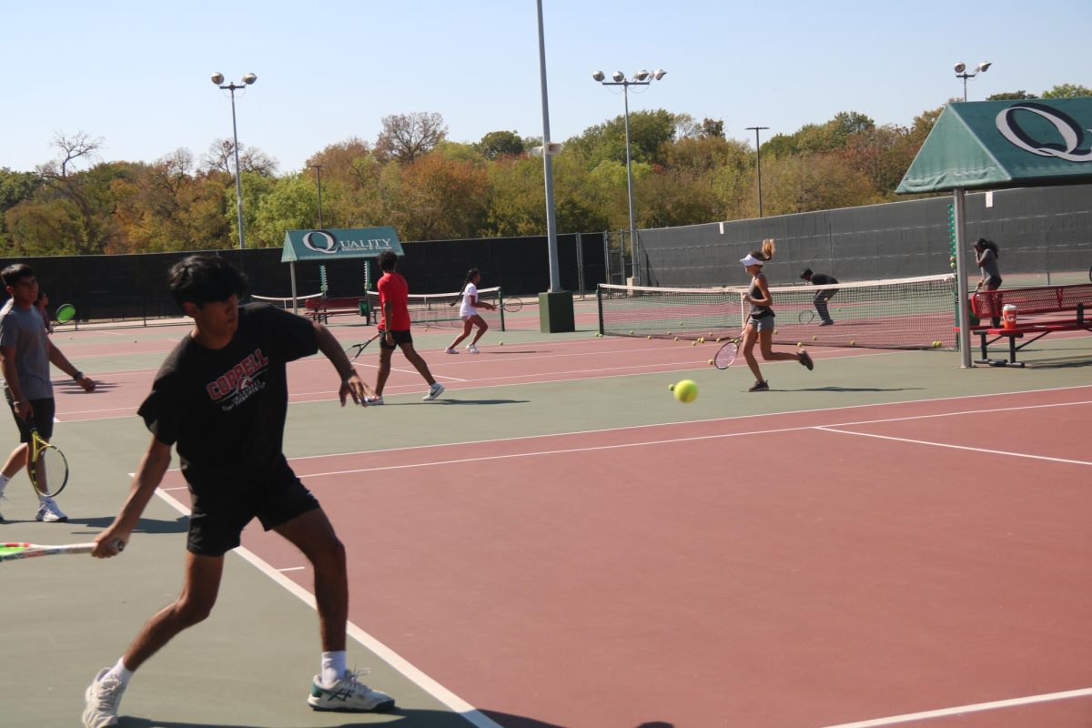 Coppell junior tennis co-captain Shay Patel hits a forehand during practice on Sept. 18.  In addition to earning multiple notable accolades, Patel brings a unique style and perspective to the team.