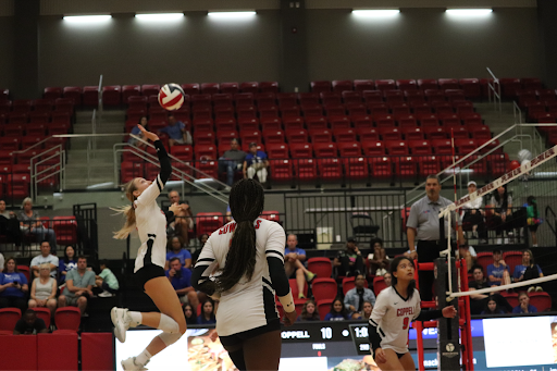 Coppell senior setter/opposite hitter spikes over the net against Plano West at CHS Arena on Friday. The Lady Wolves defeated the Cowgirls 25-8, 25-17, 25-23. 