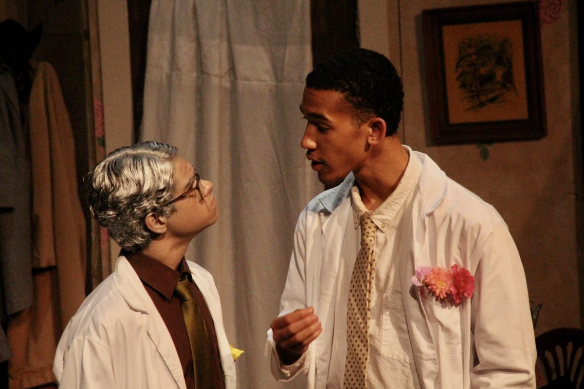 Coppell junior Sean Pompey as Dr. Lyman Sanderson, interacts with CHS9 student Max Victory as Dr. William Chumley in the fall show “Harvey” on Oct. 7. The Cowboy Theatre Company fall show ran from Oct. 6-8 in the Black Box Theatre at Coppell High School. 