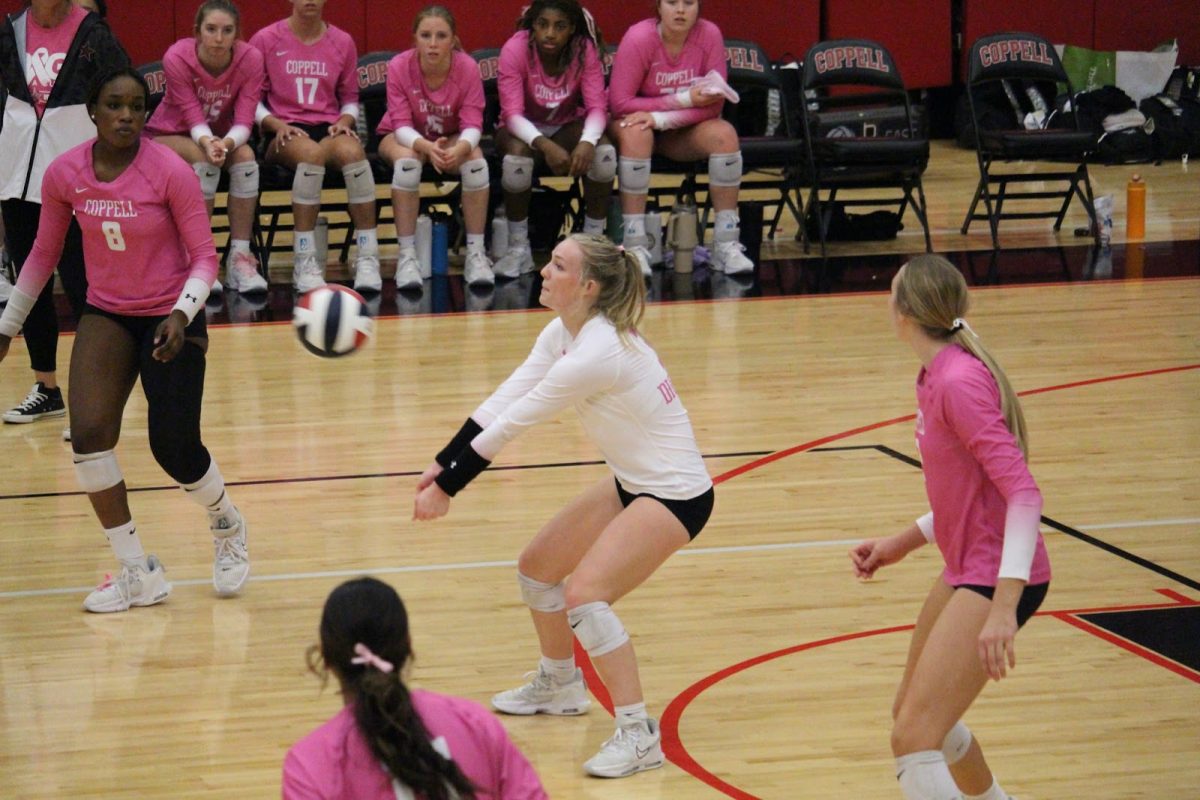 Coppell senior libero Kate McDonald digs against Plano East on Friday at CHS Arena. The Cowgirls play Hebron tonight at 6:30 p.m. at CHS Arena in their penultimate home game of the regular season.