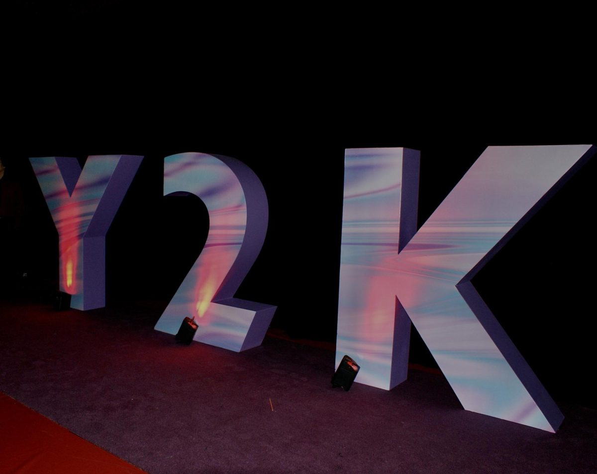 A giant Y2K sign welcomes students at the entrance of Coppell High School‘s homecoming dance on Oct. 14 at CHS Arena. The theme for the 2023 homecoming dance was Y2K based on 2000s fashion trends. 
