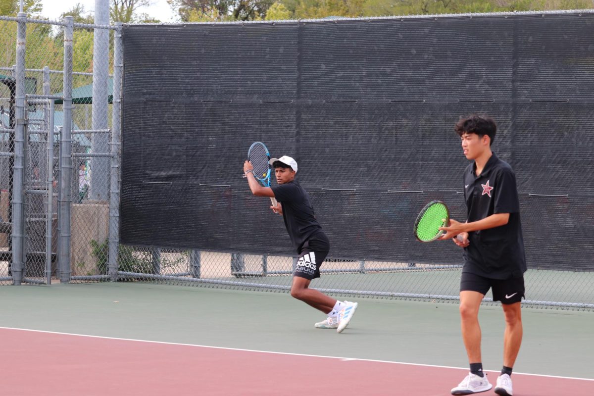 Coppell senior Isaac Joseph returns during his doubles match with senior Riki Koshimizu against McKinney Boyd on Tuesday at the Coppell Tennis Center. Coppell faces Southlake Carroll on Thursday in the Class 6A Region I semifinals in Abilene.