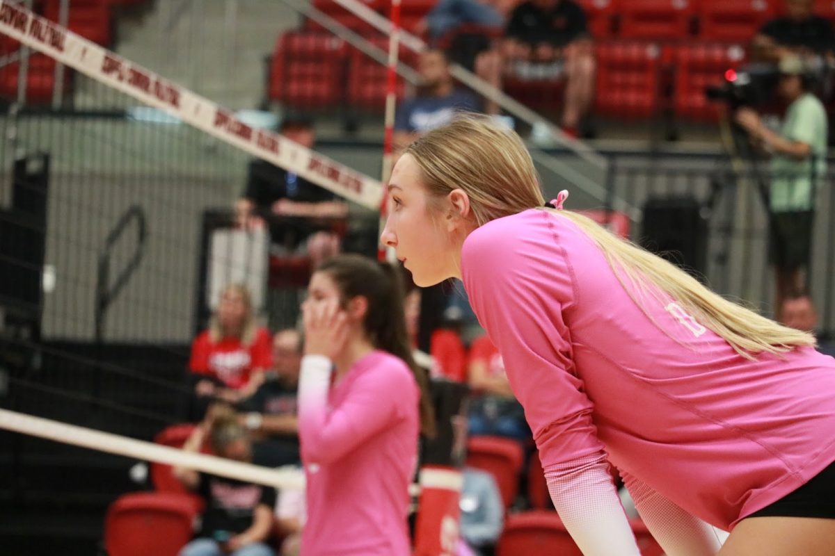 Coppell senior opposite hitter co-captain Mira Klem prepares to receive a serve on Oct. 17 against Hebron. Klem stepped into a leadership role this season and implemented the same positive influence on her teammates as her predecessors. 