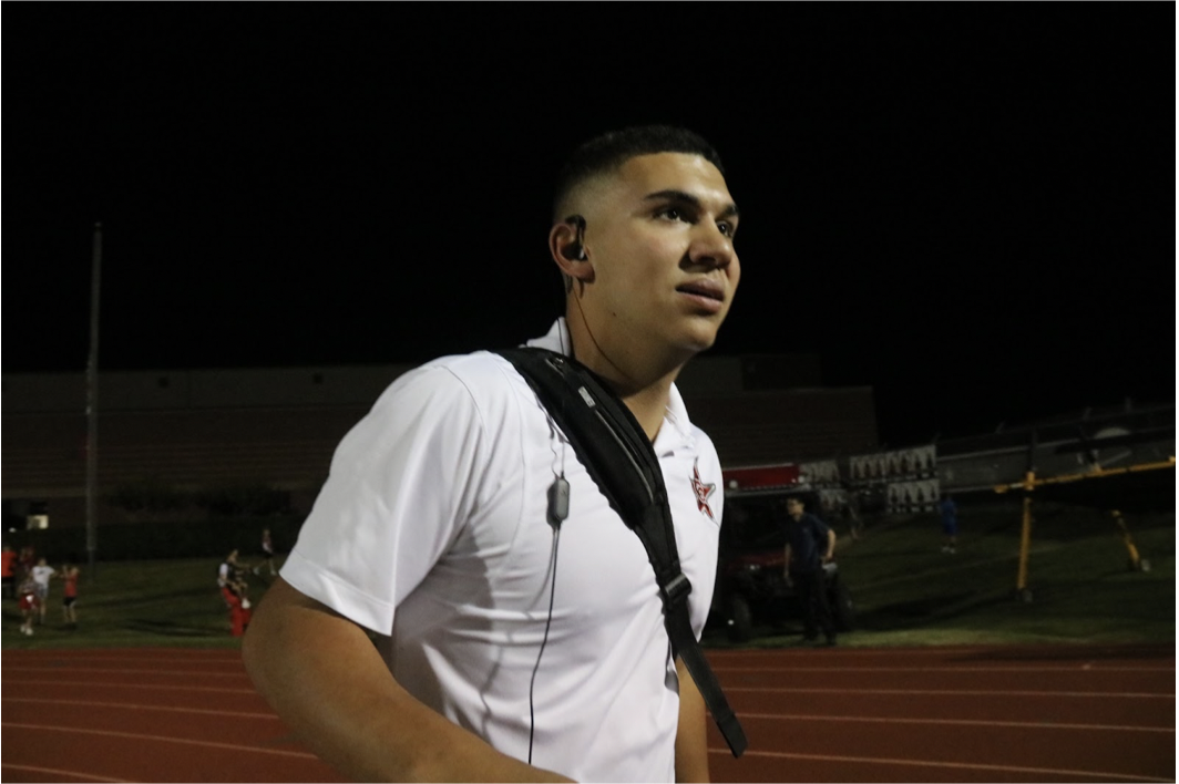  Coppell High School senior Jackson Cusano rushes to get back to Buddy Echols Field for halftime at the Coppell football game against Plano East on Oct. 13. Cusano fills the role of team manager with kindness and attention to support the team.