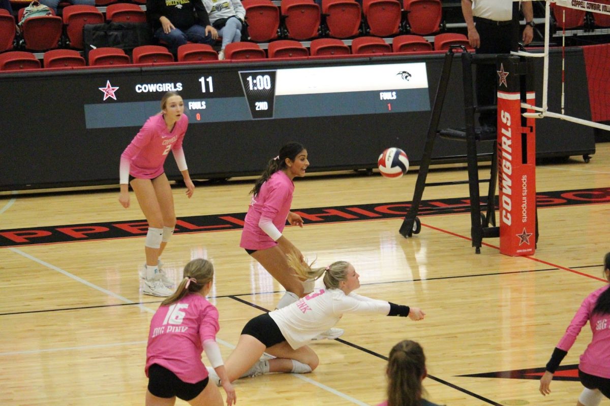Coppell senior libero Kathryn MacDonald digs against the ball from Plano East in the CHS Arena on Friday.