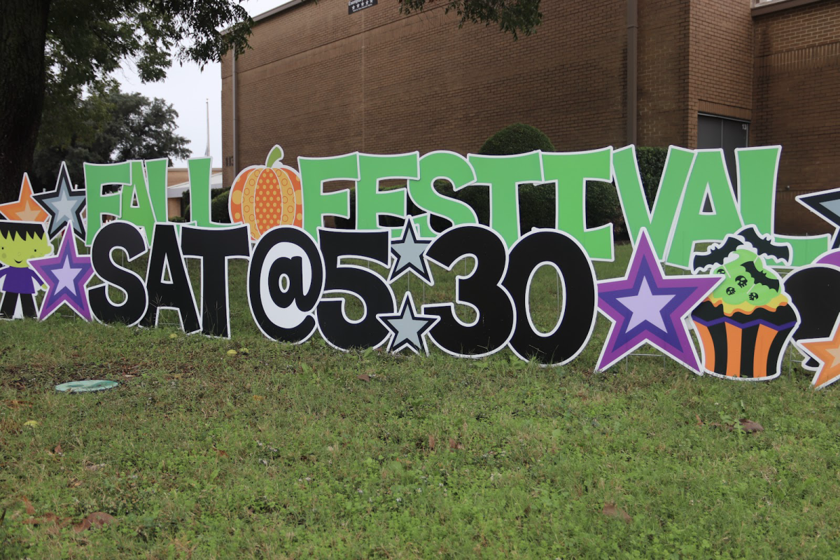 On the side of New Tech High @ Coppell, a sign welcomes visitors to the school’s Fall Festival in the campus parking lot on Oct. 28. The annual Fall Festival hosted by New Tech High @ Coppell brings a fun and festive spirit to the residents of Coppell. 