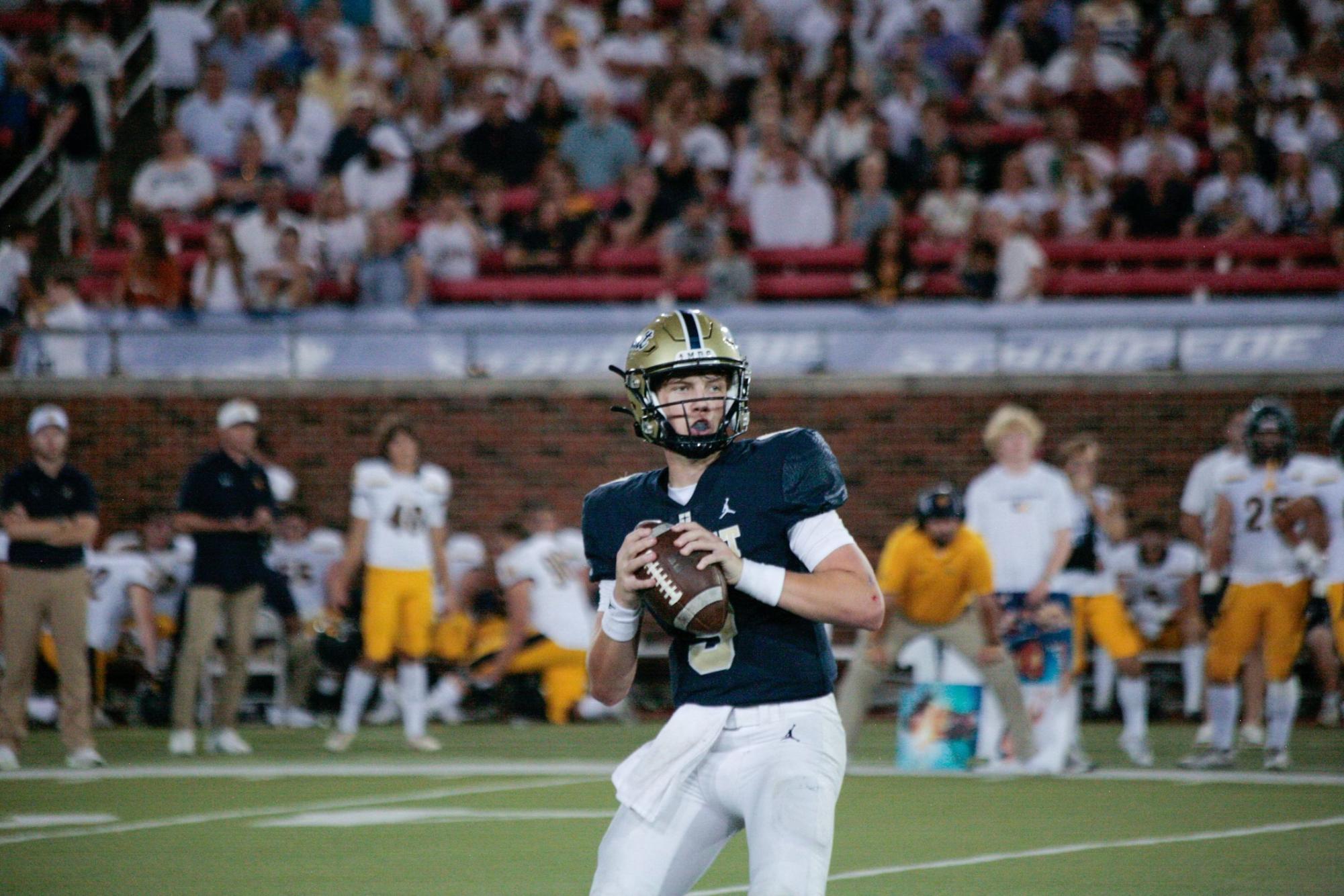 Dallas Jesuit quarterback Charlie Peters looks for an open receiver on Sept. 29 against Highland Park at SMU’s Ford Stadium. The Coppell football team plays the Rangers in the Class 6A Division II Region I area playoffs at Ford Center in Frisco on Thursday at 7 p.m. Photo courtesy Jaxx Rigelsky.