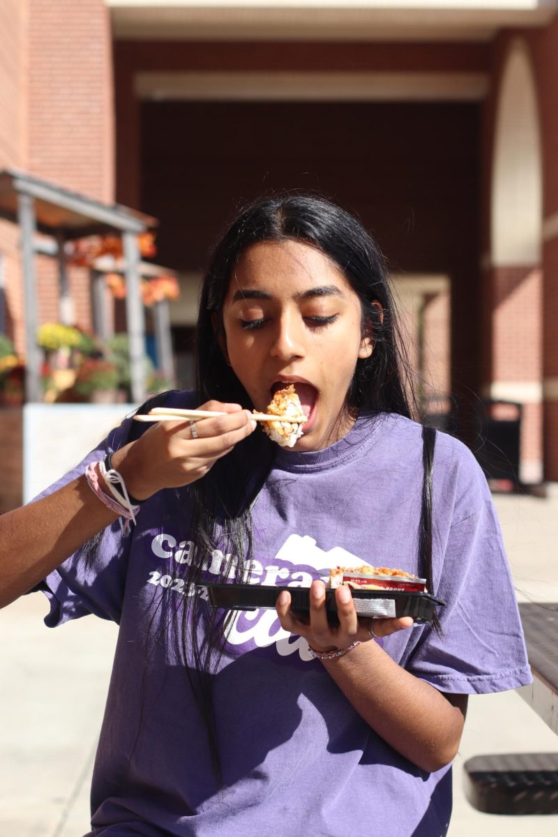 The Sidekick executive editor-in-chief Sri Achanta eats a Krispy Krab Roll from Sprouts on Oct. 18. Achanta explains how her journey as a pescatarian for the past four years has helped shape her personal destiny.