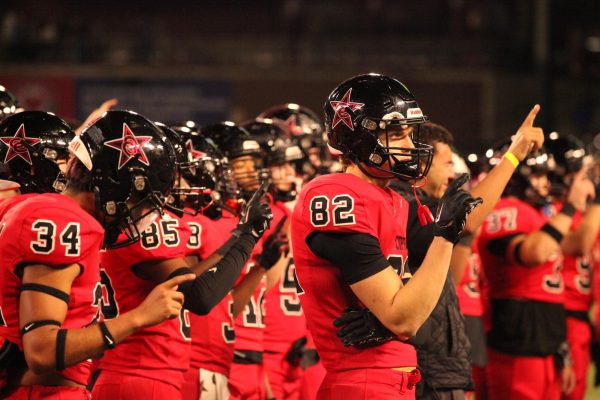 The Coppell football team sings the alma mater after losing to Byron Nelson in the Class 6A Division II Region I semifinals. Byron Nelson defeated the Cowboys, 52-45, at Choctaw Stadium in Arlington on Saturday.