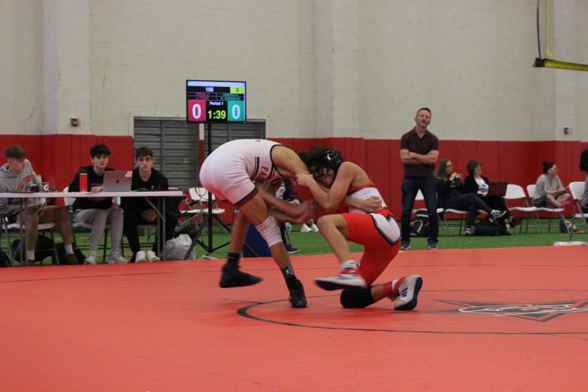 Coppell freshman wrestler Josh Perez wrestles a Lewisville player in the Coppell Round-Up at the Coppell High School Fieldhouse on Nov 17. The Cowboys placed third in this meet as they look forward to another good year of wrestling.