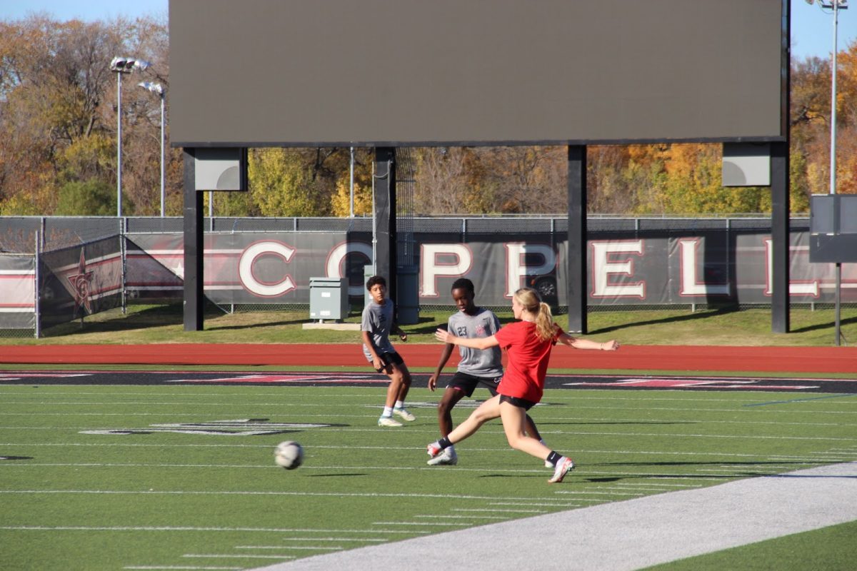 Coppell junior Claire Pafford scrimmages the boys JV2 team at Buddy Echols Field on Dec. 4. The Cowgirls open the 2024 season on Jan. 4 against Wakeland.