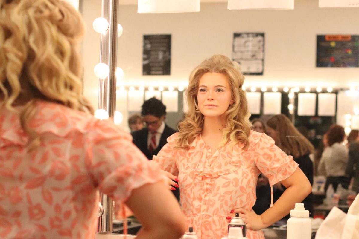 Coppell High School senior Olivia Willey prepares to play Doralee Rhodes on Thursday in the final dress rehearsal of Coppell Cowboy Theatre Company’s spring musical “9 to 5.” “9 to 5” is playing in the Coppell High School Auditorium Friday to Sunday.