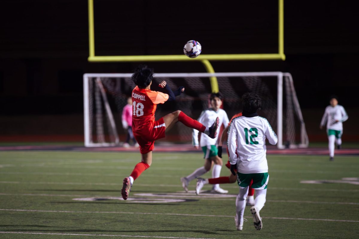 Coppell junior defender Chris Diaz plays a ball against Azle at Buddy Echols Field on Friday. The Cowboys plays Plano West in the first District 6-6A game of the season at 7:30 p.m. at Buddy Echols Field on Tuesday.