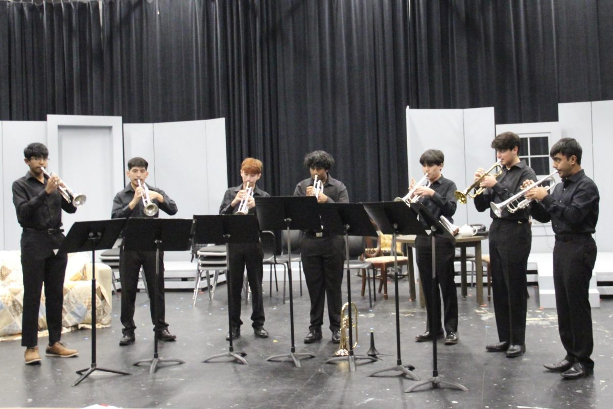 Coppell High School trumpet septets close the Chamber Ensemble Festival with Kyle Myers’s “Discovery for Trumpet Ensemble” in the Black Box on Feb. 20. The Chamber Ensemble Festival is an annual event showcasing pieces performed by Coppell Band members. 
