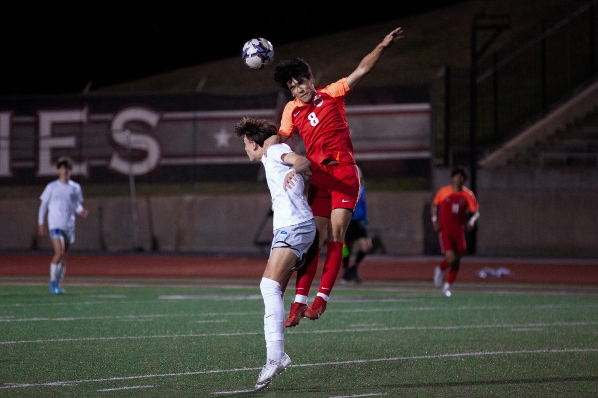 Coppell senior midfielder Anson Skorka hits a header against Hebron at Buddy Echols Field on Tuesday. The Cowboys play Plano on Tuesday at 7:30 p.m. on Buddy Echols Field.

