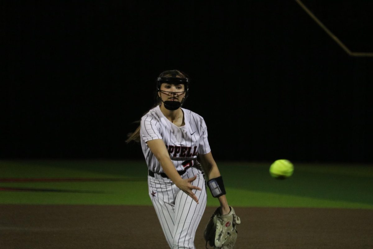 Coppell junior Kayla Shannon pitches against Southlake Carroll on Tuesday at the Coppell ISD Baseball/Softball Complex. The Dragons defeated the Cowgirls, 8-4.