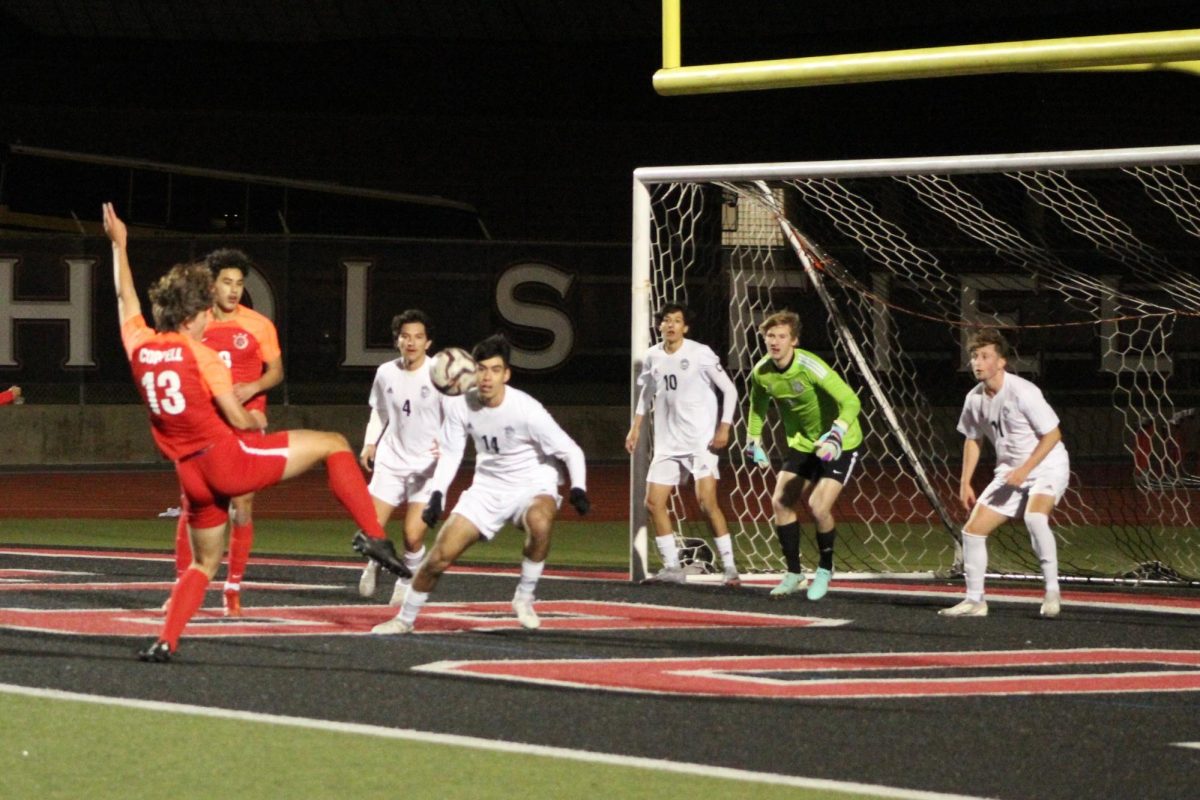 Coppell junior forward J McGill shoots against Flower Mound at Buddy Echols Field on March 8. Flower Mound defeated Coppell, 3-2.