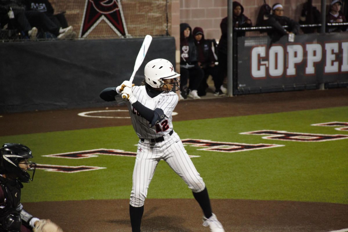 Coppell center fielder Nevaeh Carter hits at Coppell ISD Baseball/Softball Complex on March 8. On Friday, the Cowgirls play against Plano West at CISD Baseball/Softball Complex at 7:30 p.m. 
