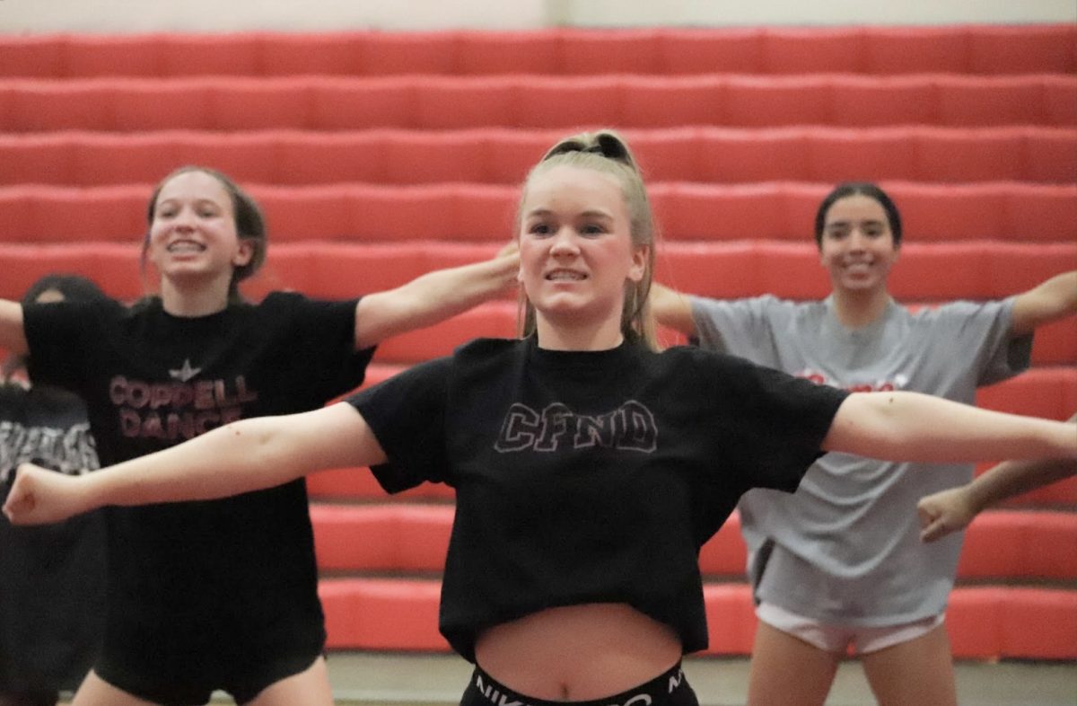 Coppell freshman Anna Grace Gauntt practices at CHS Small Gym on March 1. Gauntt is the CHS9 cheer captain and leads through a positive mindset.