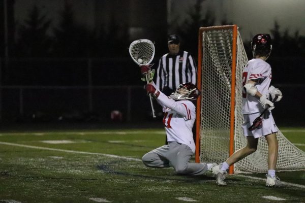 Coppell sophomore Ian Nichols makes a save against Lovejoy on Feb. 29. The Coppell boys lacrosse team hosts Dallas Jesuit at 7:30 p.m. at Lesley Field in its first district home game of the season.