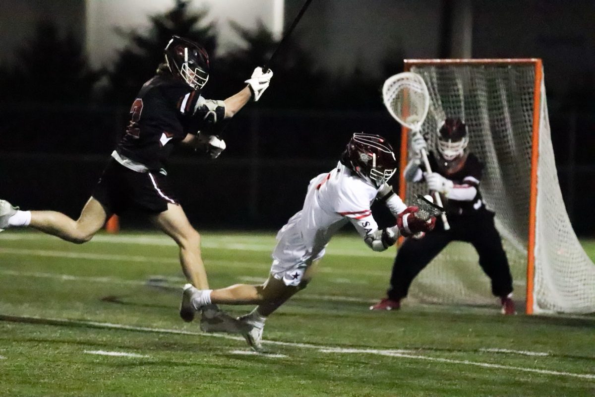 Lovejoy senior defender Zachary Branch deters Coppell sophomore attack Duncan Ross on Thursday at Lesley Field. The Leopards defeated the Cowboys, 11-3.