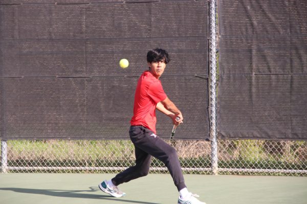 Coppell junior Shay Patel returns with a backhand during a singles match against League City Clear Creek last Friday at the Coppell Tennis Center. Coppell hosted a breakout tournament with sites at Coppell, Lewisville Harmon, Hebron, Flower Mound Marcus and Flower Mound. 