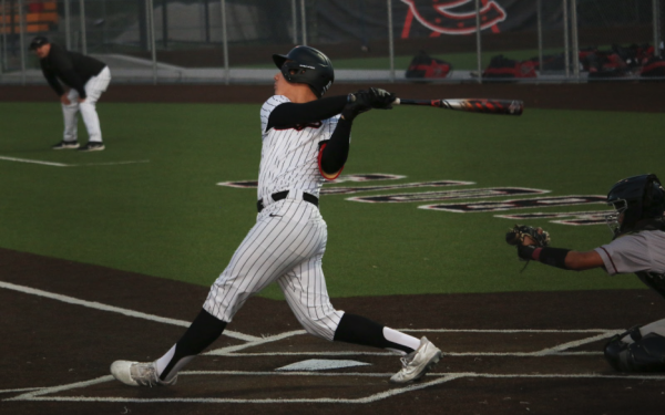 
Coppell junior first baseman Joaquin Oaxaca bats against Plano during the first inning on Tuesday at Coppell ISD Baseball/Softball Complex. The Cowboys defeated the Wildcats, 2-1. 